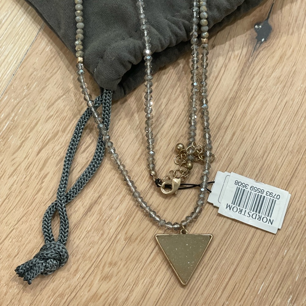 Beaded necklace with‎ triangle crystal dangle. NWT.